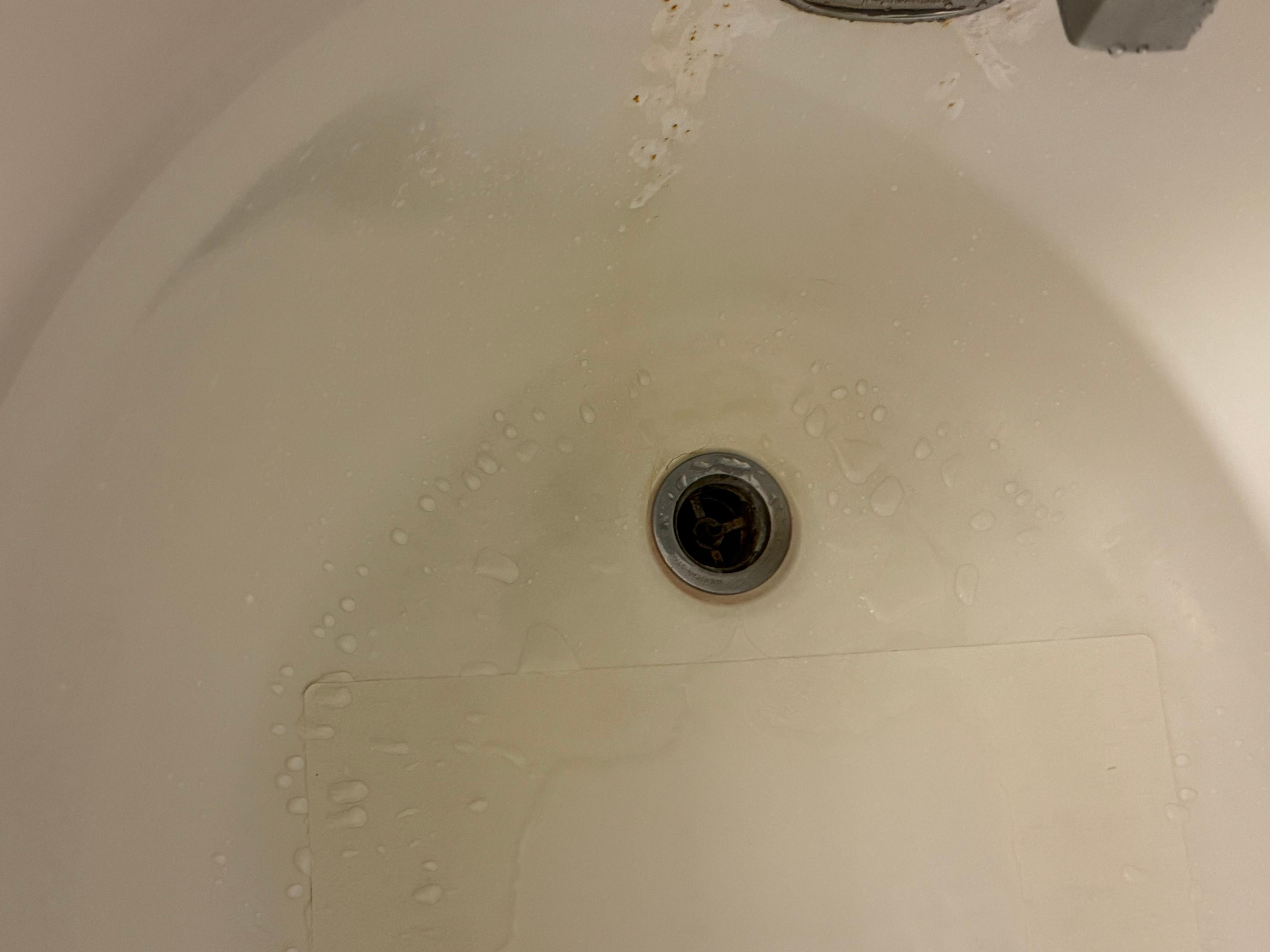 Stained tub. In need of resurfacing. 