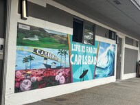 Love the painting on the wall in the waiting for the shuttle area