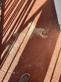 Outside walkway needs painting.