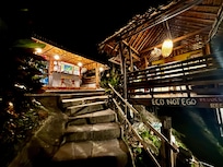 Night view up the last few steps to reception