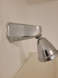 Old and pitted shower head