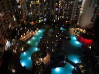 View of pool at night