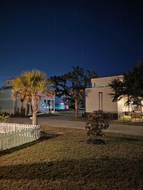 Beautiful view of fireworks offered on the beach New Year's Eve.