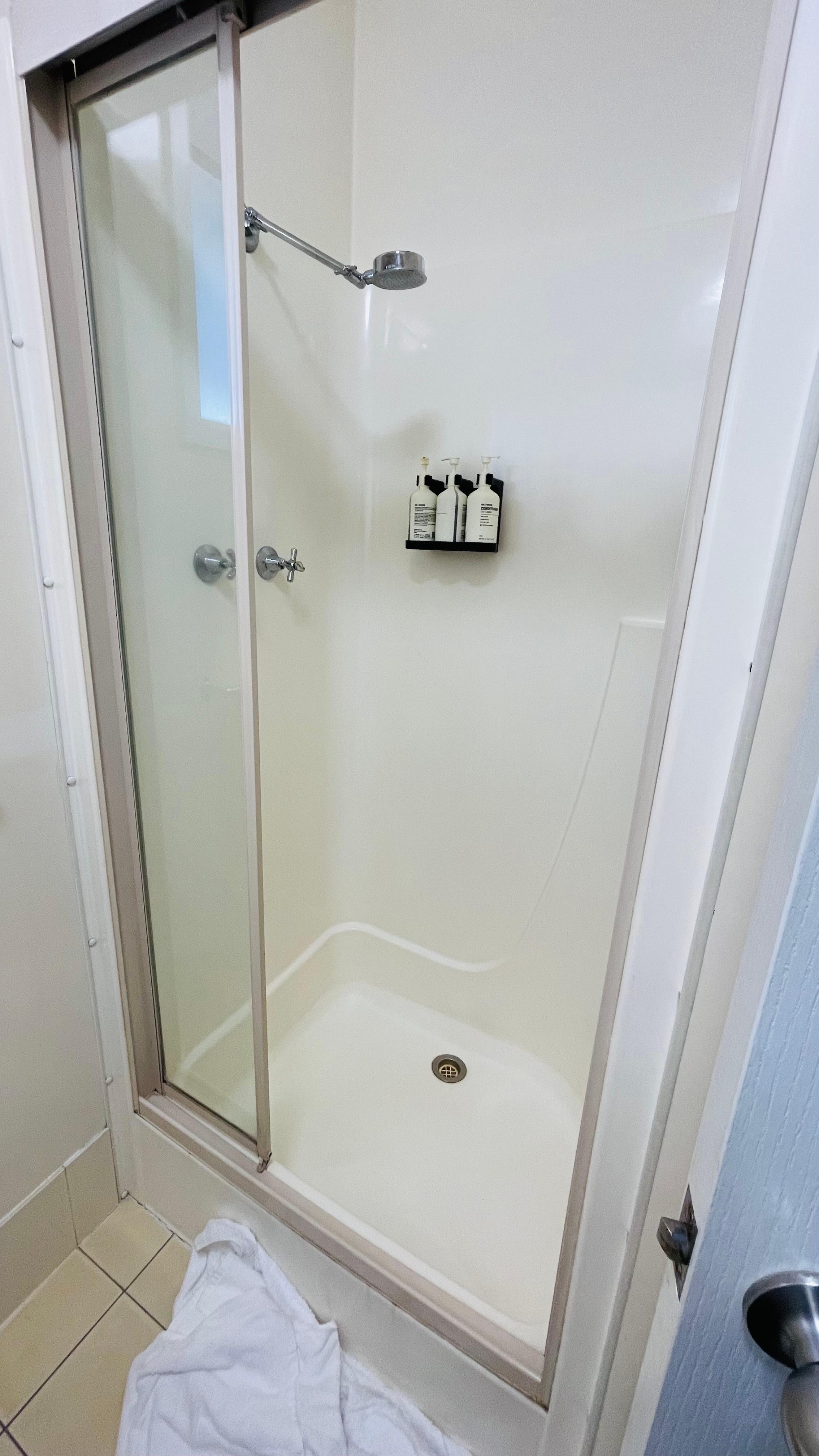 Shower booth no glass door.