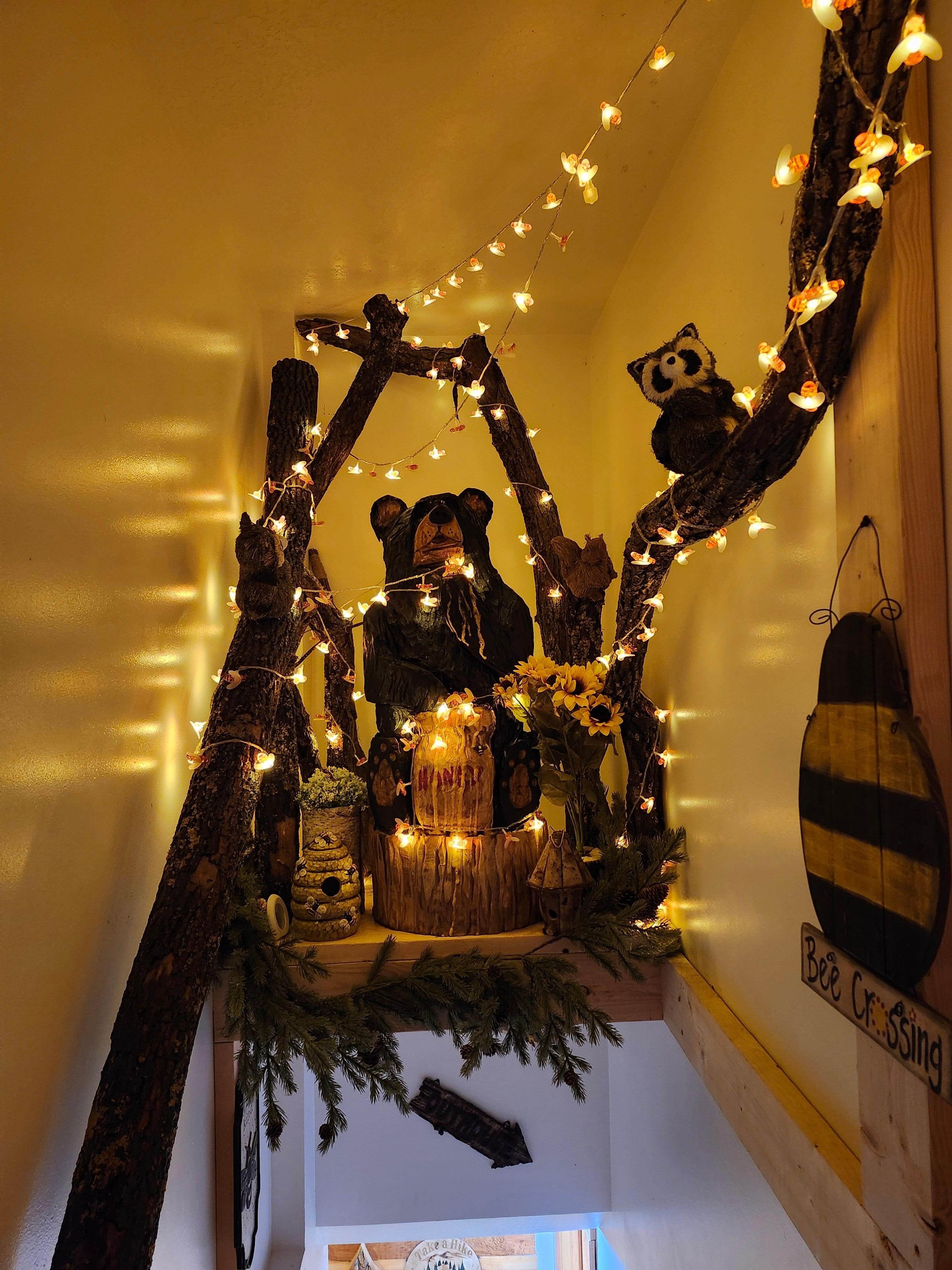 Above the stairs to the basement is this little honey bear display.