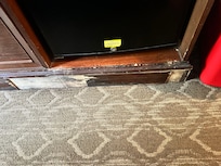 Paneling missing around mini fridge