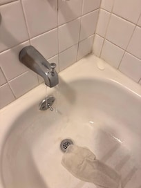 Someone else’s dirty washcloths left in tub