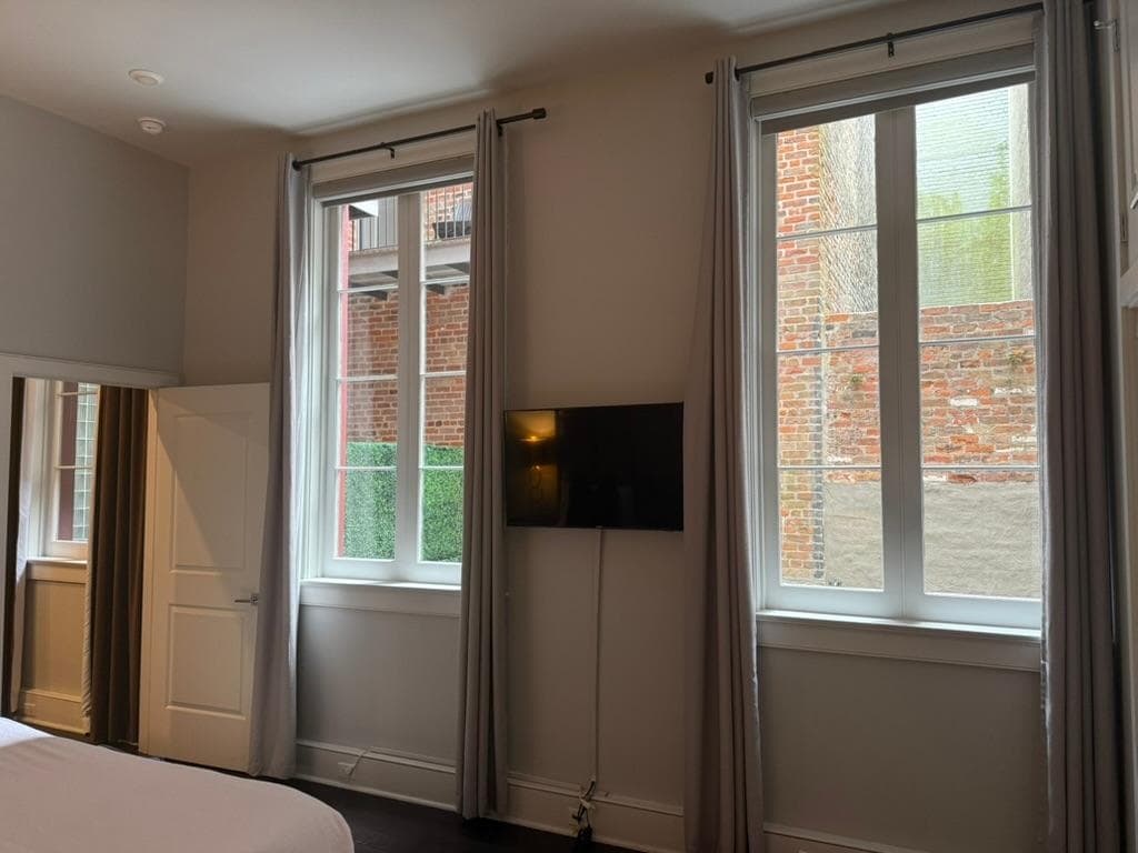 Outer master bedroom wall to view patio 