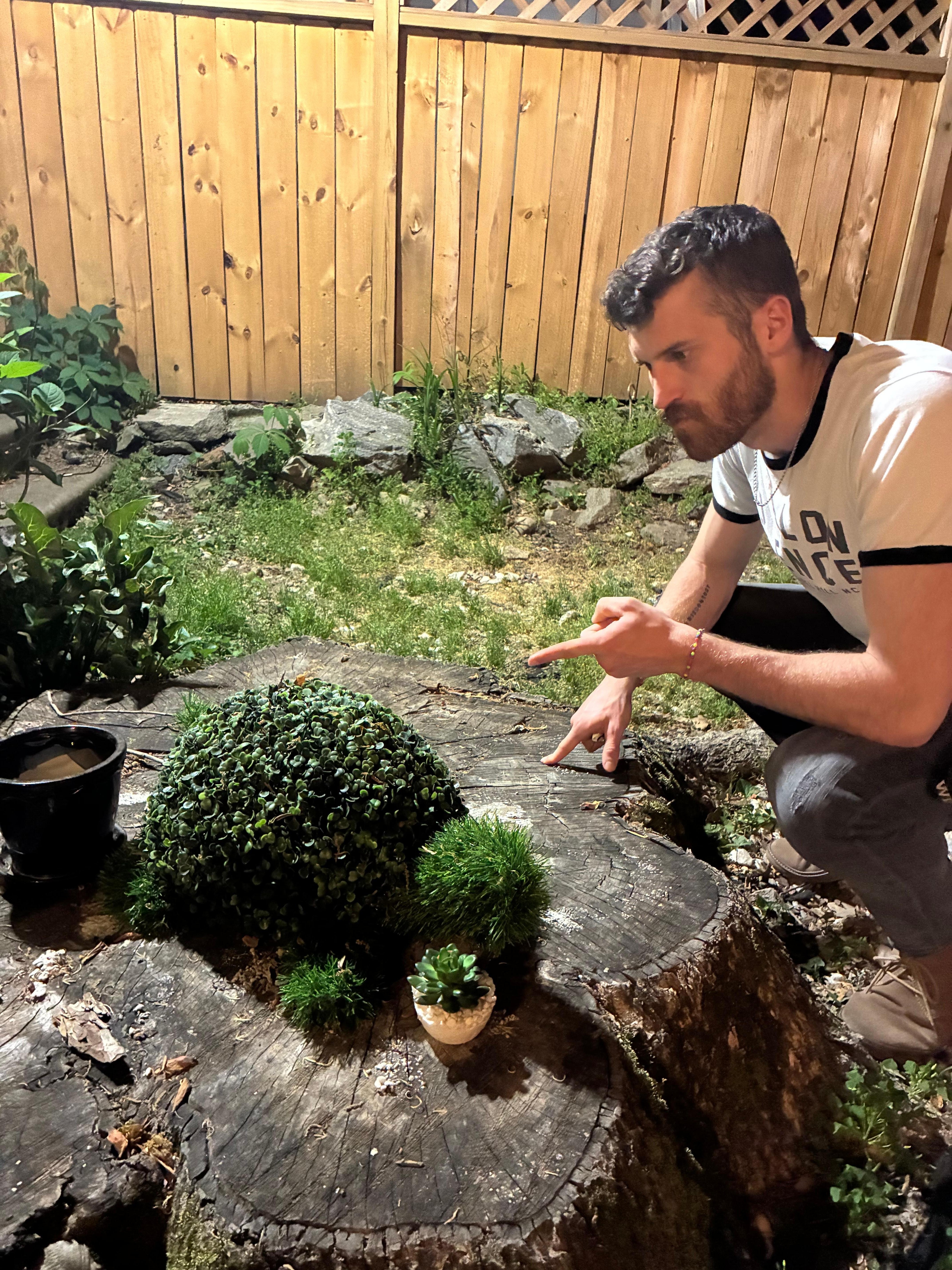 The yard had so many fabulous pieces of garden art- and a fire pit.