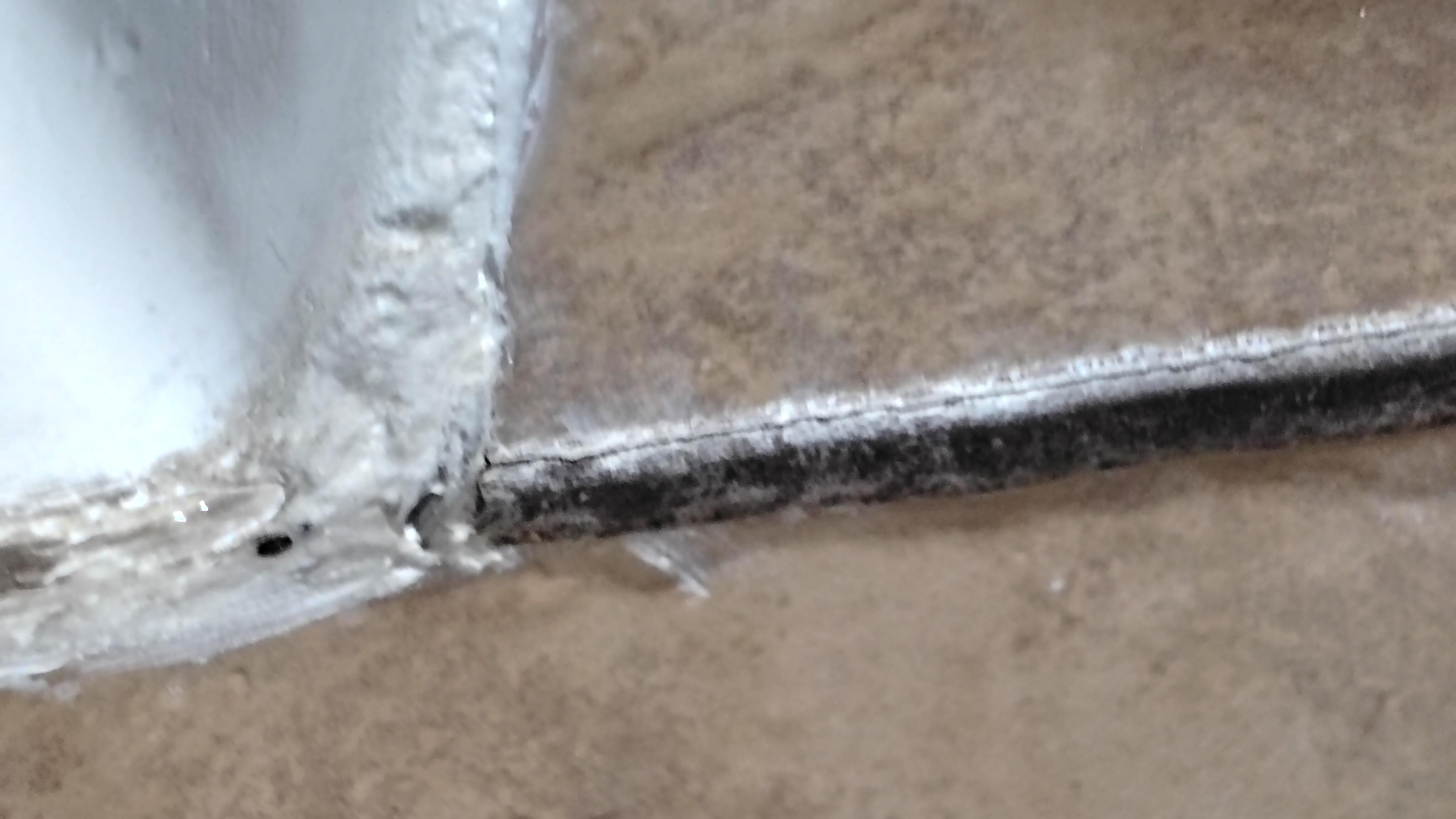 A huge gaping crack filled with black mold which if breathedcinwith hot wet air will make your lungs sick 