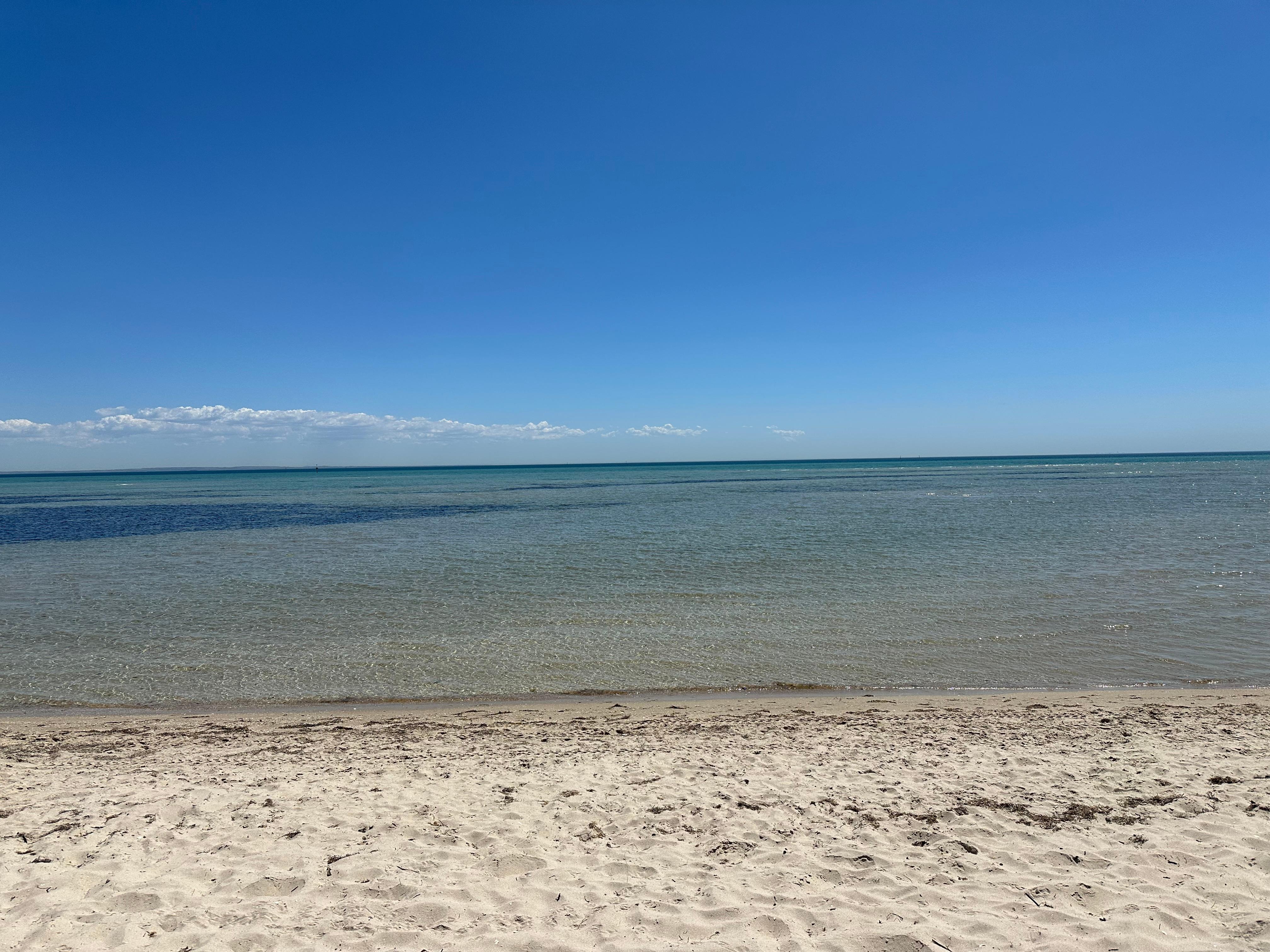 Beautiful beach just across the road.