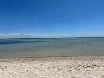Beautiful beach just across the road.