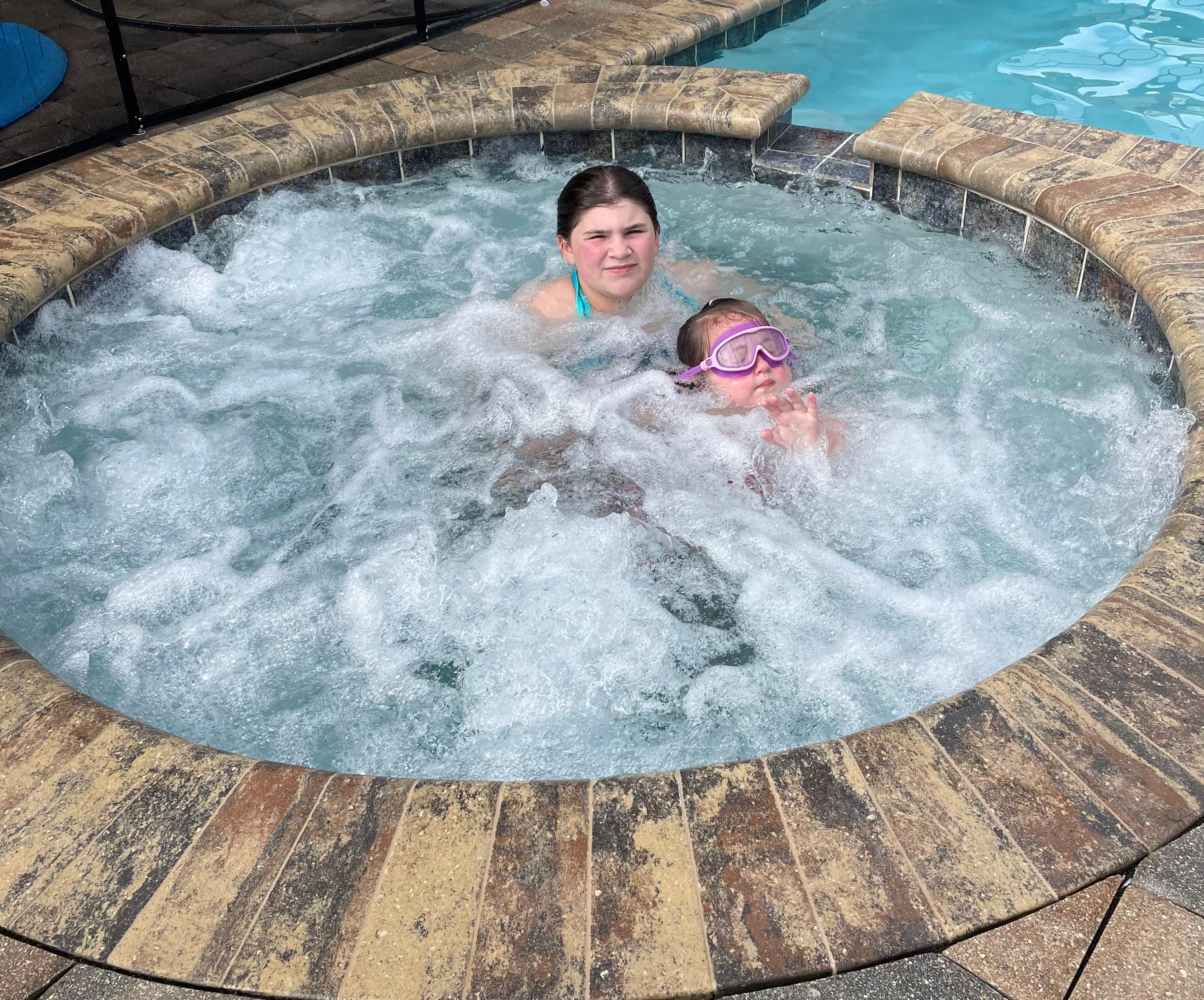 Kids love hot tub & pool.