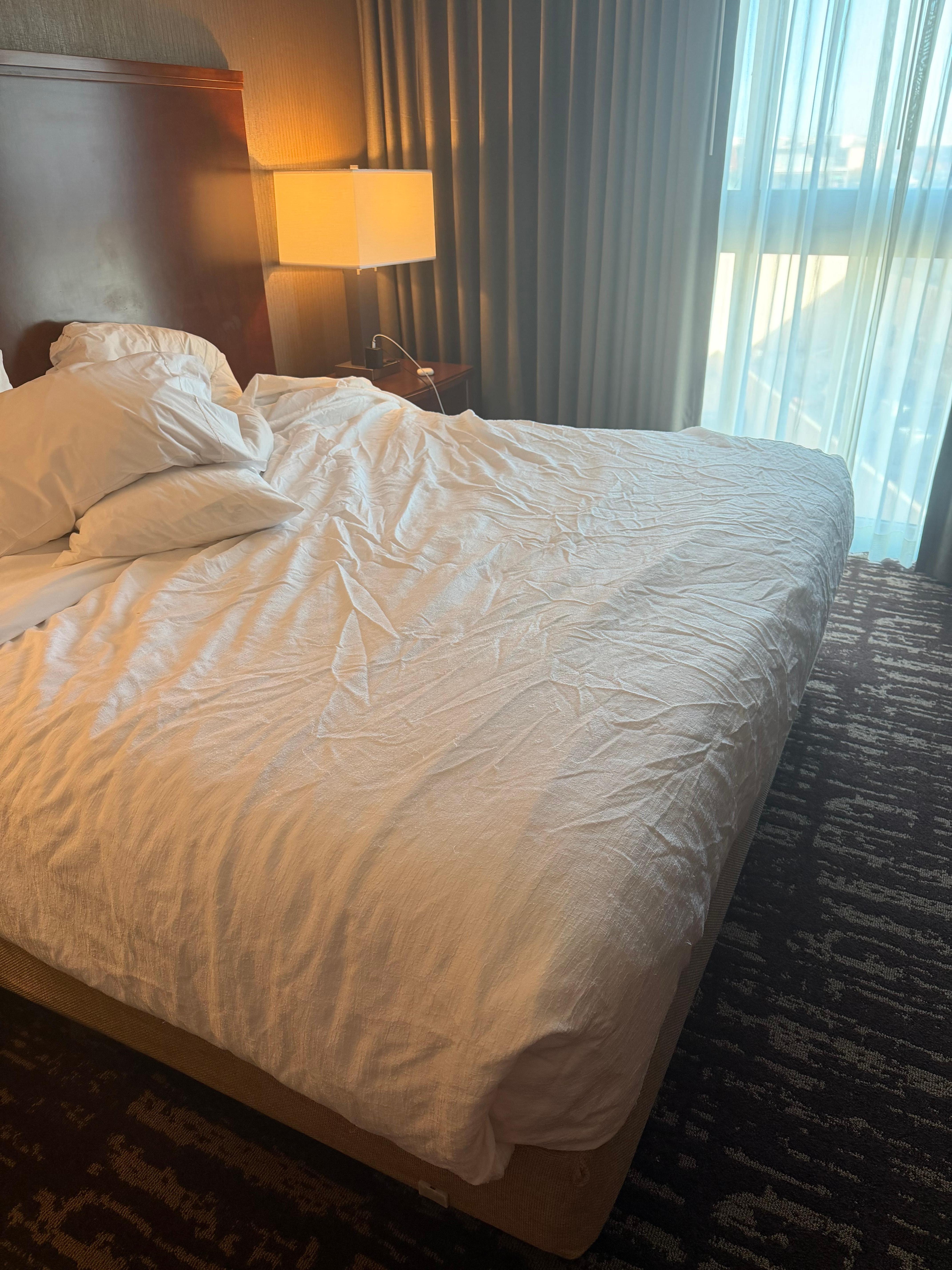 Wrinkled bedsheets obviously not changed.