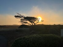 Sunset from side deck outside of dining area.