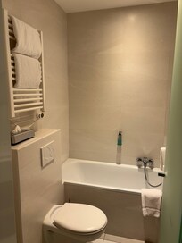Bathroom. shower could be busy not much for partition. Towel warmer!
