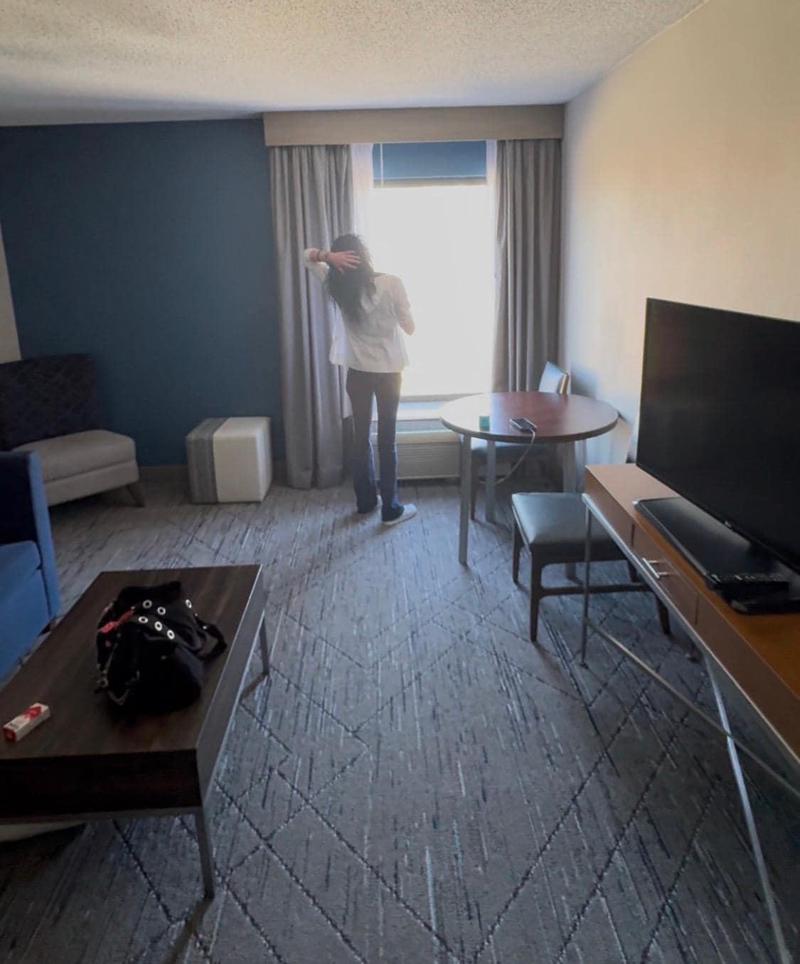 The wife looking out of the window at Cincinnati