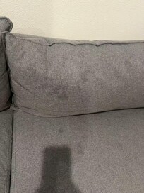 Large greasy patches on the sofa