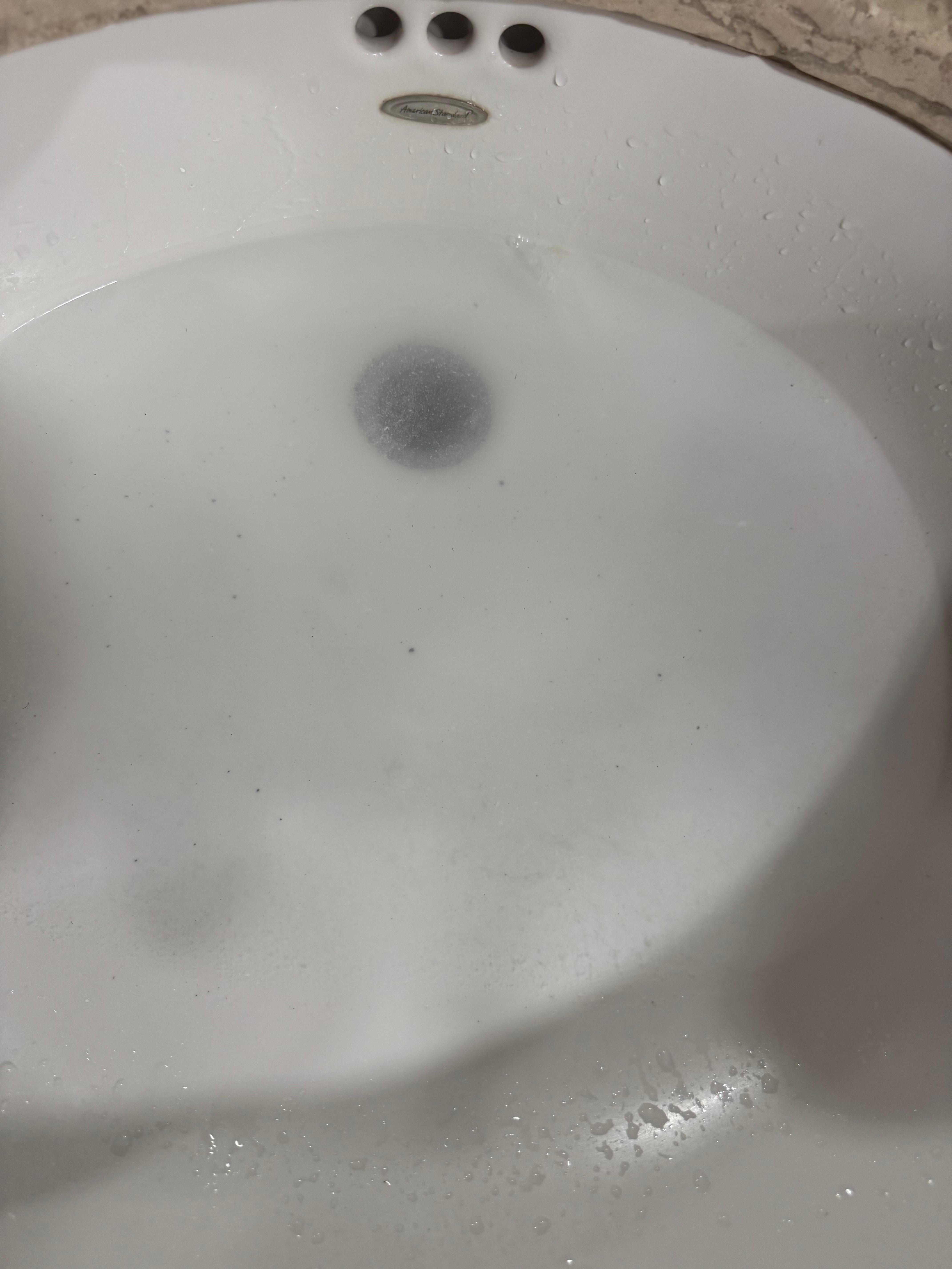 Sink plugged. Email and text sent with photo, NO reply. 