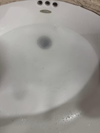 Sink plugged. Email and text sent with photo, NO reply.