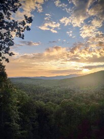 Sunset on the deck with rocking chairs