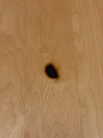 Burn on bedside table.