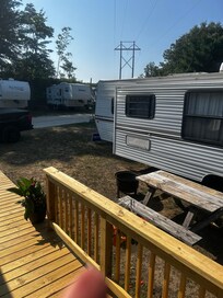 The closeness to the other camper next door. Fire pit/table is all there is