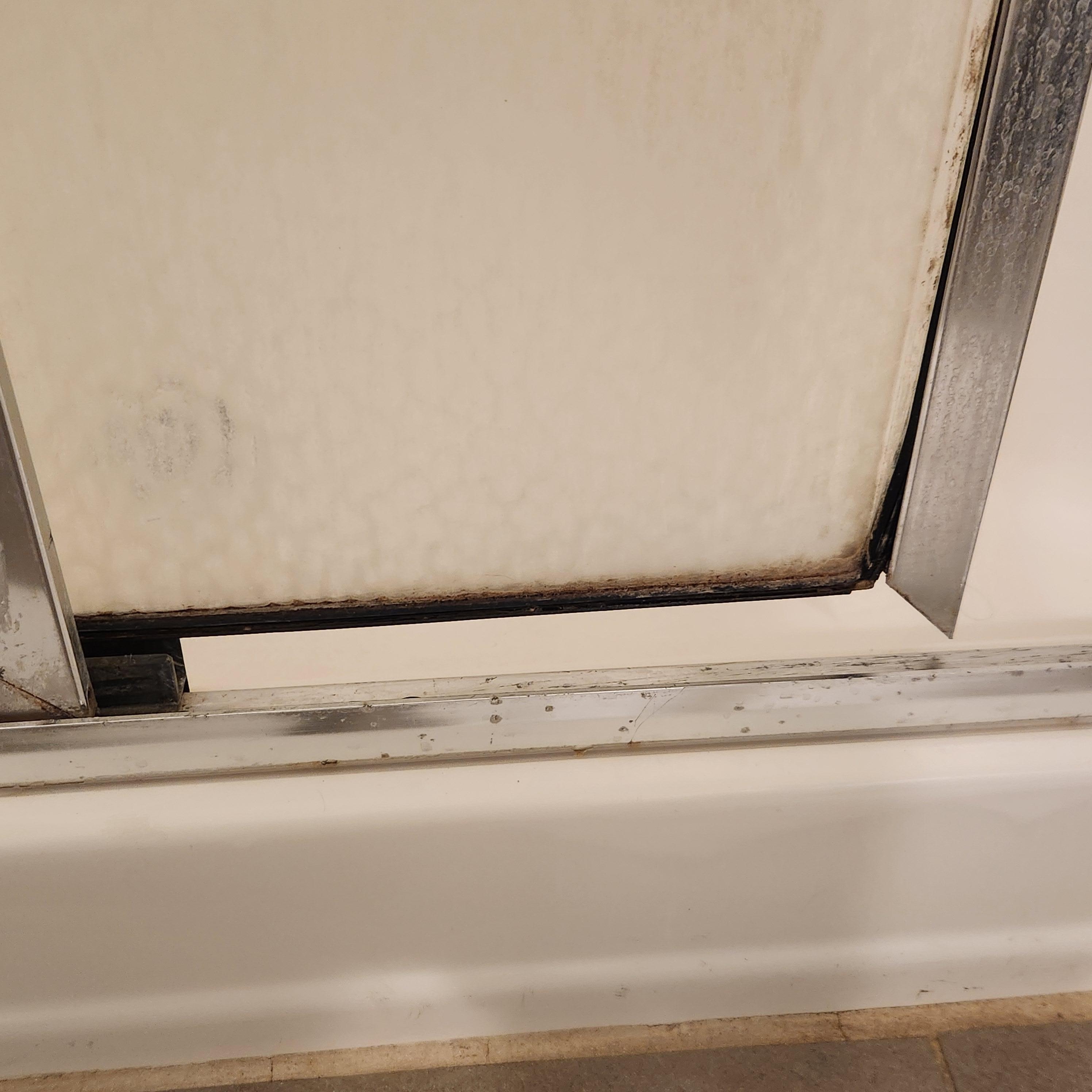 Broken shower door frame