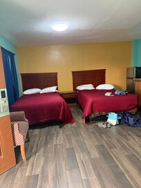 Back to tv, right is the bathroom and to the left door