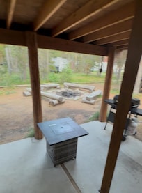 Backporch and firepit. Not shown is a closed in area with seating.