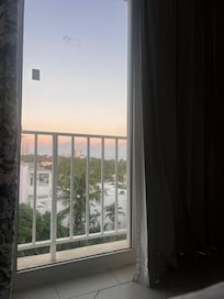 This was my view. The balcony is just a big window. You can’t step out. Balcony window DOESNT open.