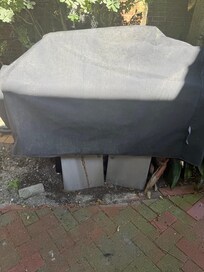 This grill is disgusting. It’s rusty full of trash and spider webs.