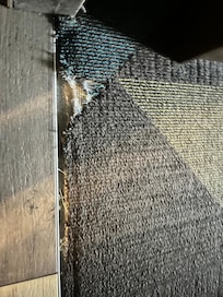 Torn carpet