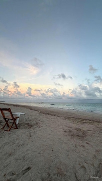 Pôr do sol na praia que a pousada dá acesso.