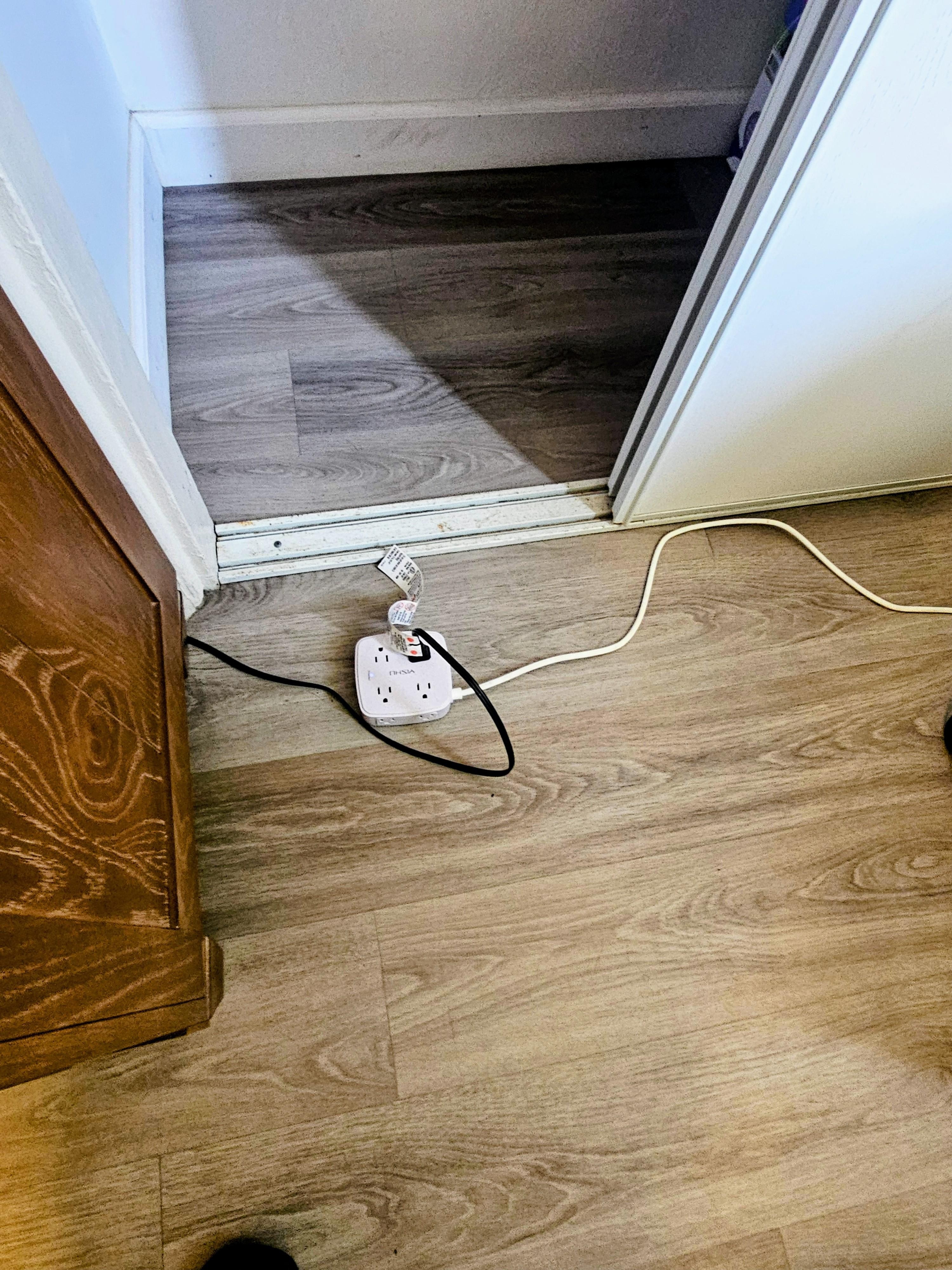 Unsafe use of extension cords throughout the unit.