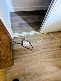 Unsafe use of extension cords throughout the unit.