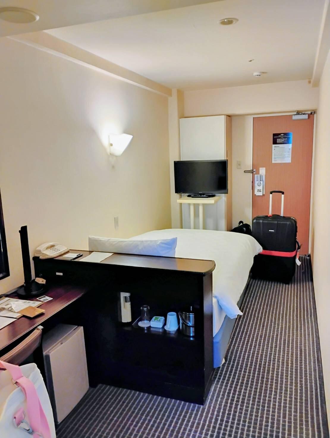 The room is not big but if your are under 6'2" and 250 lbs, you should be OK.  Unbeatable hotel location in Shinagawa!