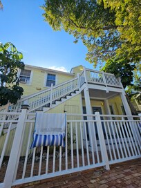 View from the pool. The unit is at the top of the stairs.
