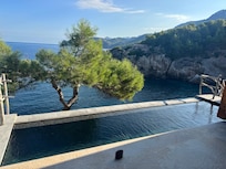 view of pool and Cala Deia