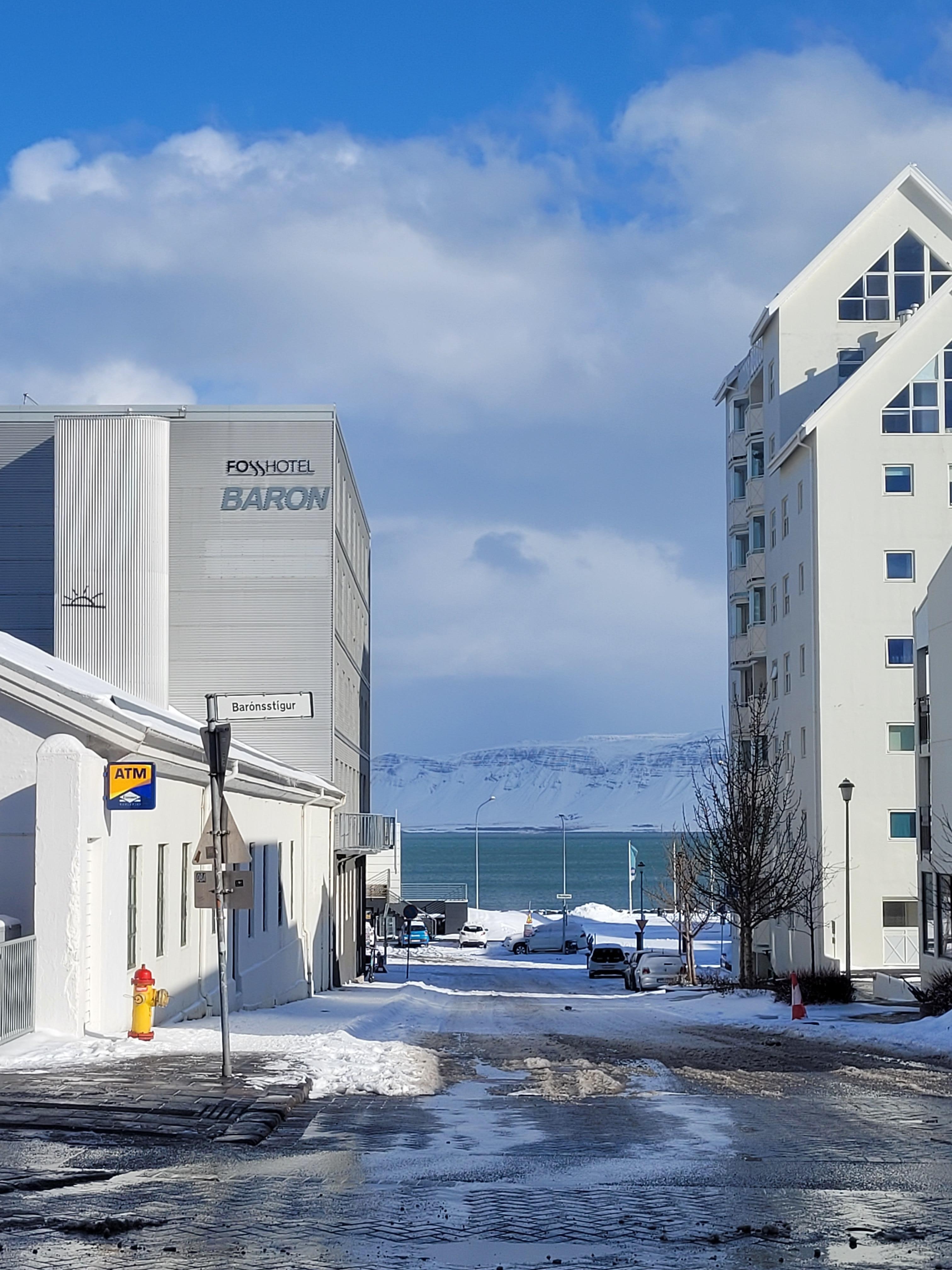 In front of the hotel, mountain view.