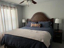 King bedroom. Very comfortable. Lots of plug ins near bed.