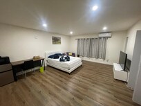 The bedroom is spacious, though I would have appreciate and area rug beneath the bed. The windows are west facing, so the sun beams directly into the room in the afternoon causing it to heat the space quickly. I kept the curtains closed to keep cool.