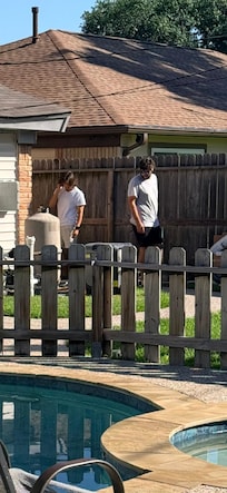 The 2 men just showing up unannounced during our stay to work on pool