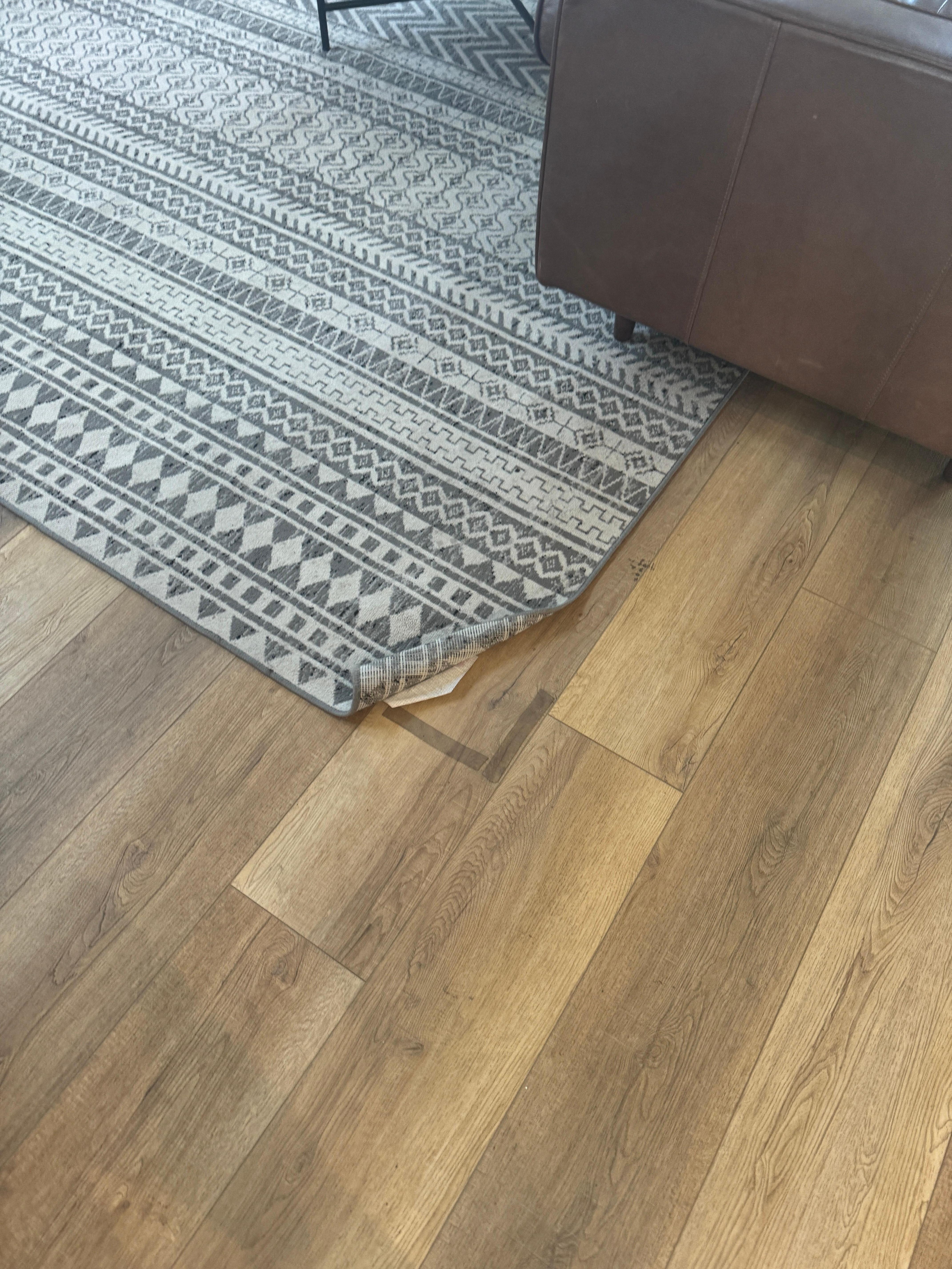 Curled up rugs in bedrooms and family rooms posing significant safety risks. 