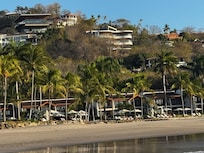 The place is just behind this small beachfront community