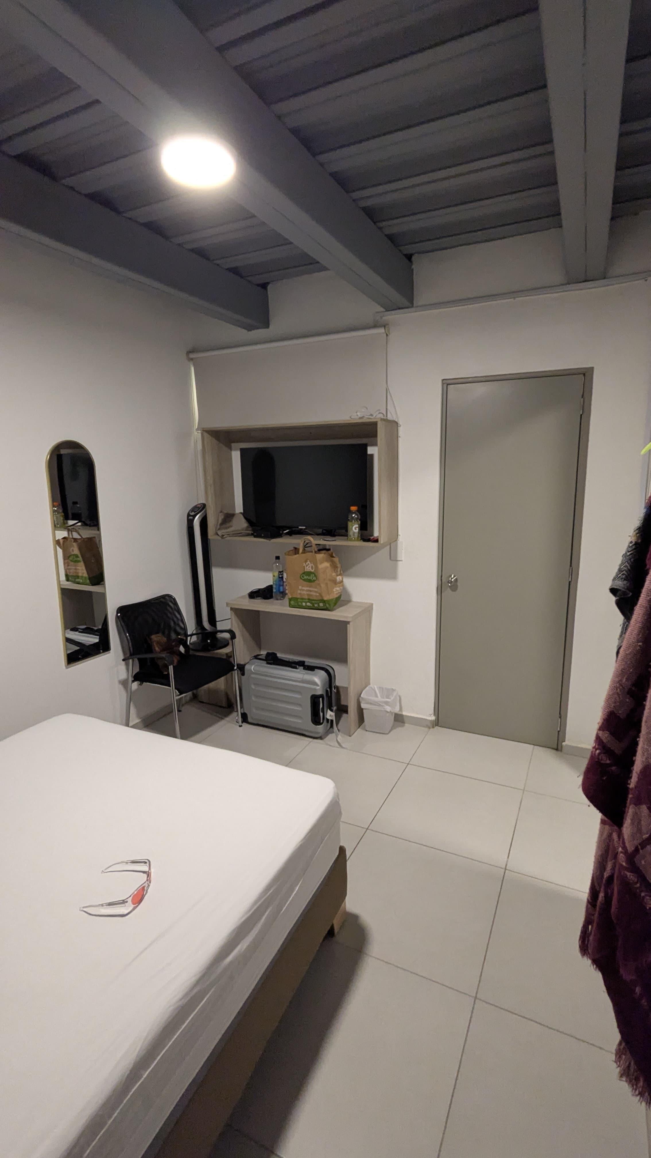 Very small window above TV was the only window 