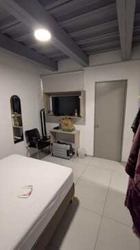 Very small window above TV was the only window