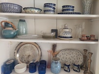 Tastefully decorated with old style dinner ware.