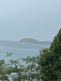 I had a full ocean view from my balcony. This particular morning a light mist was falling.