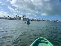 Kayaking in front of our apartment